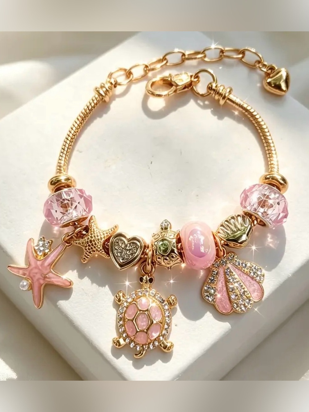 Gold-Tone Pink Sea Charm Bracelet. - Picture 5 of 8